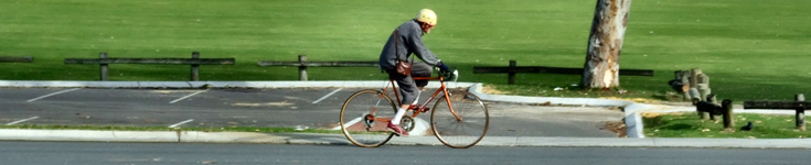 Retired man riding bicycle